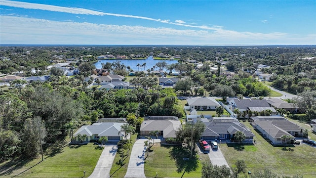 bird's eye view with a water view