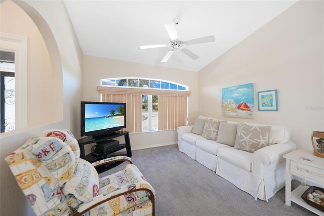 18395 Edgewater Dr, Port Charlotte, FL 33948 - carpeted living area with arched walkways, baseboards, lofted ceiling, and ceiling fan