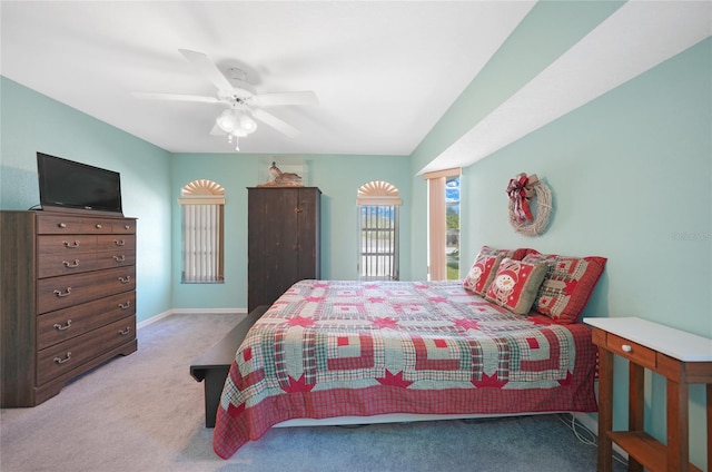 18395 Edgewater Dr, Port Charlotte, FL 33948 - carpeted bedroom featuring baseboards and a ceiling fan