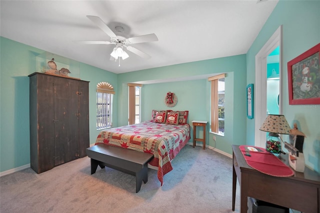18395 Edgewater Dr, Port Charlotte, FL 33948 - carpeted bedroom with baseboards and a ceiling fan