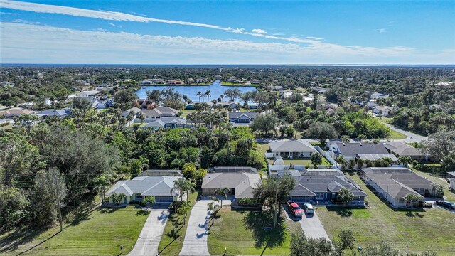 18395 Edgewater Dr, Port Charlotte, FL 33948 - birds eye view of property with a residential view and a water view
