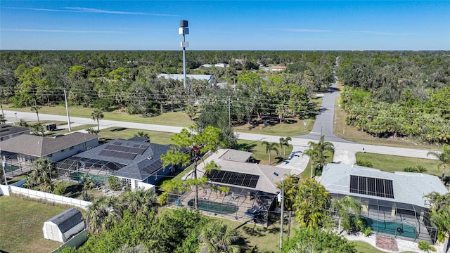 18395 Edgewater Dr, Port Charlotte, FL 33948 - aerial view featuring a wooded view and a residential view