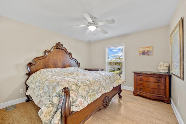 bedroom with ceiling fan and light wood-type flooring