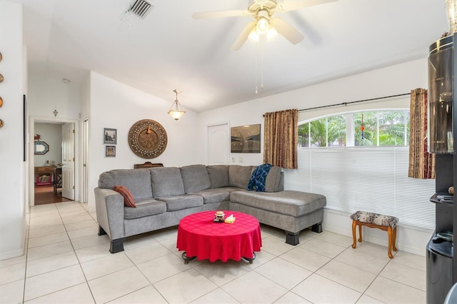 living room featuring ceiling fan and light tile patterned floors