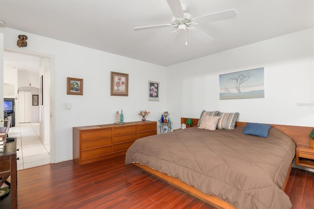 bedroom featuring dark hardwood / wood-style flooring and ceiling fan