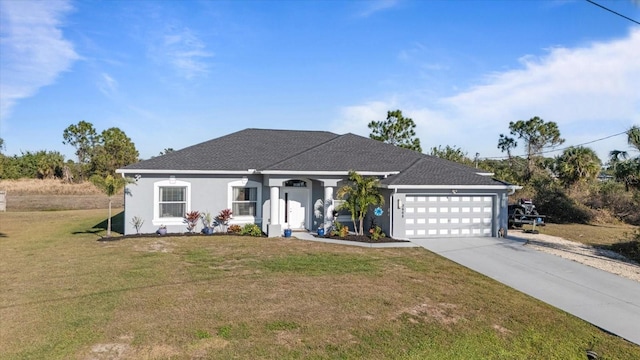 single story home featuring a front lawn and a garage