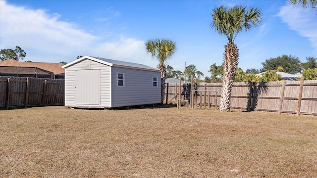 view of yard featuring a storage unit