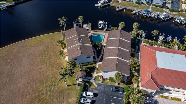 birds eye view of property featuring a water view