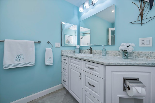 bathroom with vanity and tile patterned floors