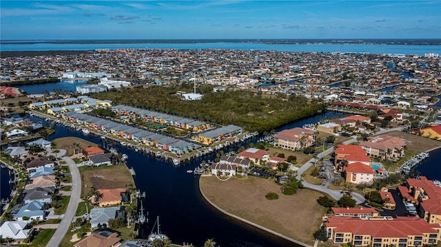 drone / aerial view featuring a water view