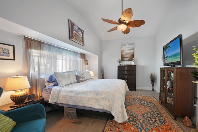 bedroom featuring vaulted ceiling, light hardwood / wood-style floors, and ceiling fan