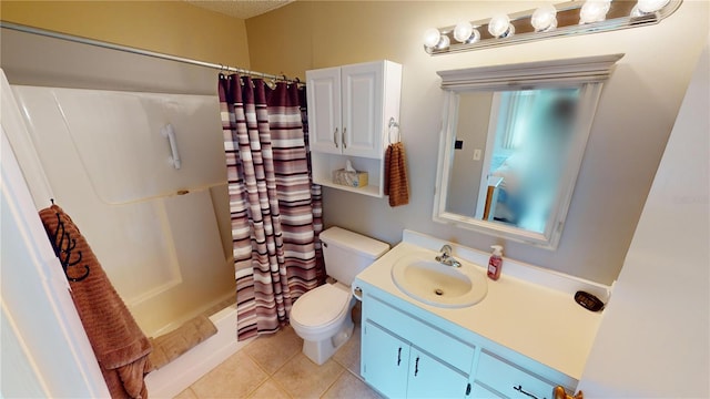 full bathroom featuring vanity, toilet, tile patterned flooring, and shower / bath combo with shower curtain