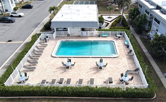 view of swimming pool featuring a patio area