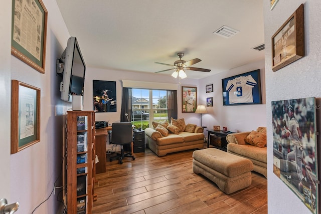 interior space with ceiling fan