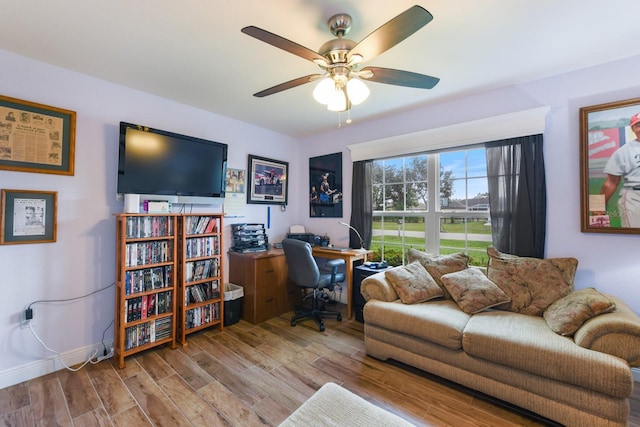 living room featuring ceiling fan