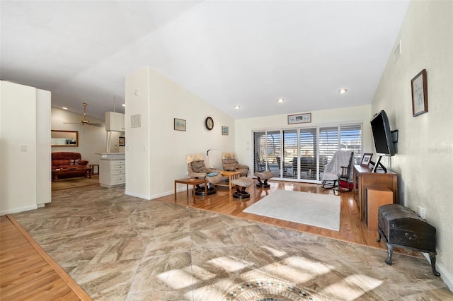 living room featuring high vaulted ceiling