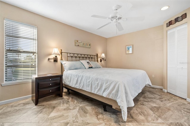 bedroom featuring a closet and ceiling fan