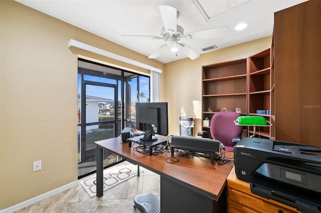 office space featuring ceiling fan