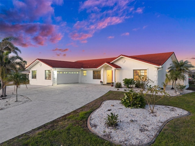 single story home featuring a garage