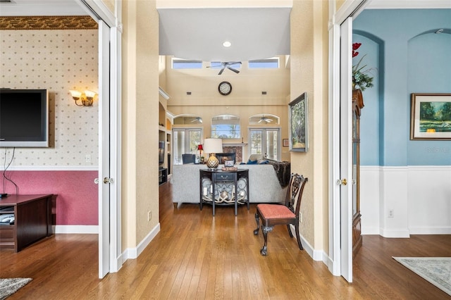 corridor with wood-type flooring