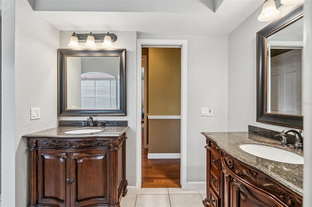 bathroom featuring vanity and tile patterned flooring