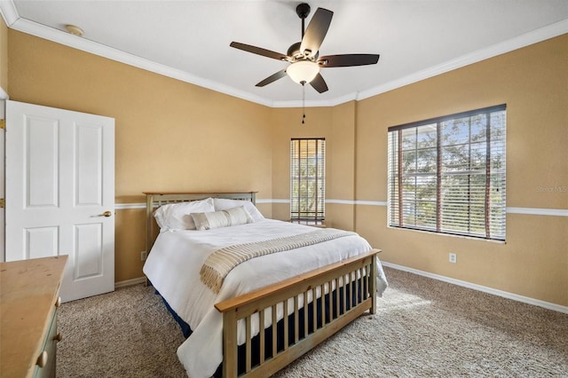 bedroom with ornamental molding, carpet floors, and ceiling fan