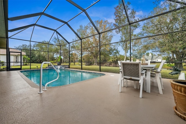 view of swimming pool with a patio area, glass enclosure, and a lawn