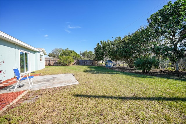 view of yard with a patio area