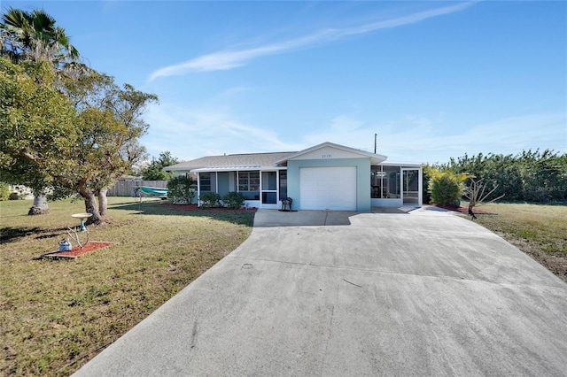 ranch-style house with a garage and a front yard