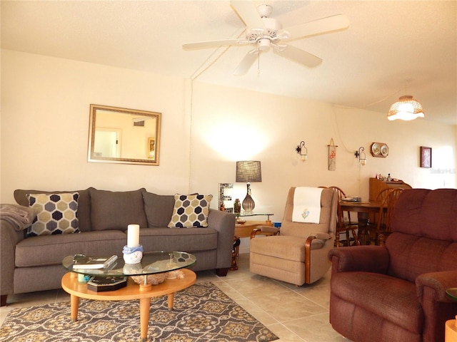 tiled living room with ceiling fan