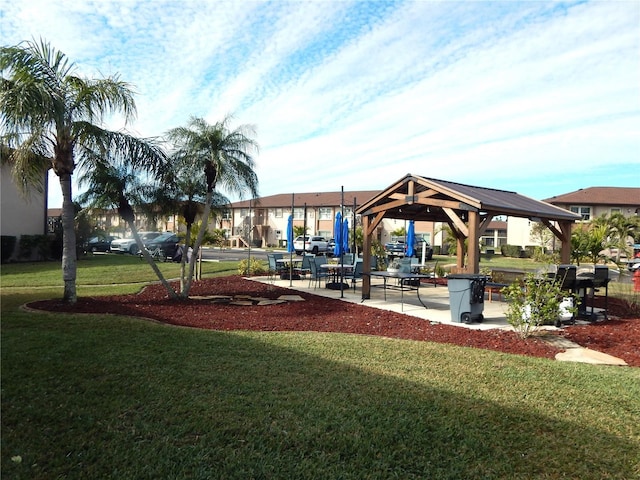 view of playground with a gazebo and a yard