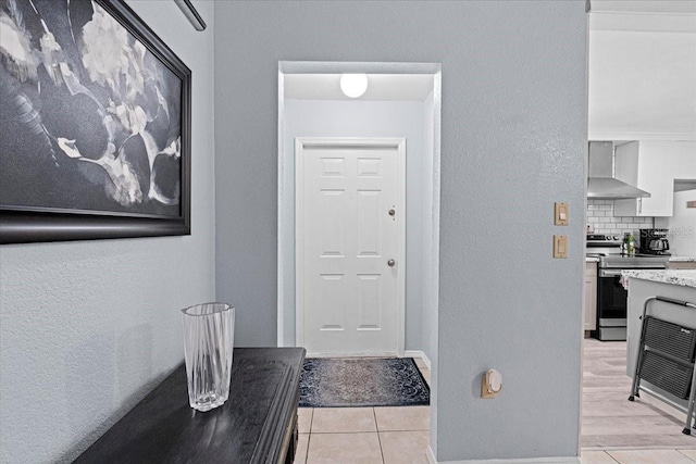 interior space with light tile patterned floors