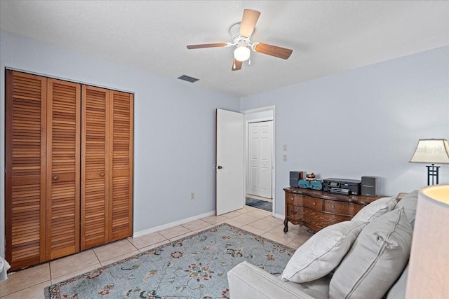 interior space featuring a textured ceiling and ceiling fan