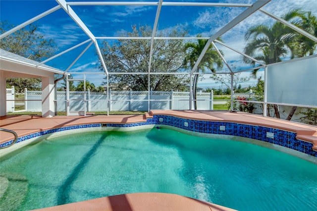 view of pool featuring a lanai and a patio