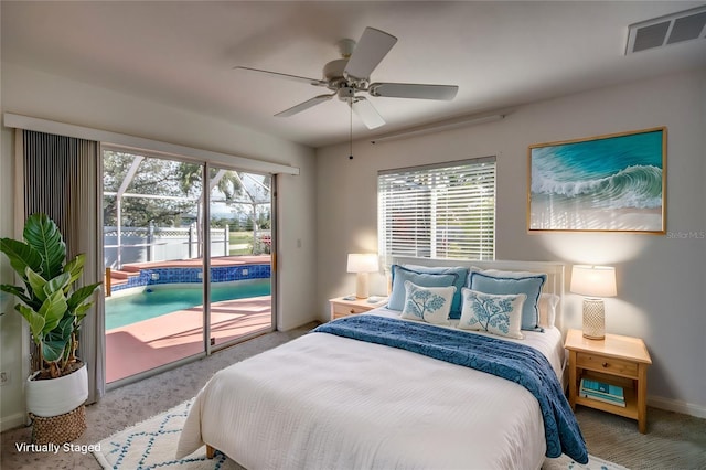 carpeted bedroom featuring access to exterior and ceiling fan