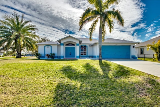 single story home featuring a garage and a front lawn