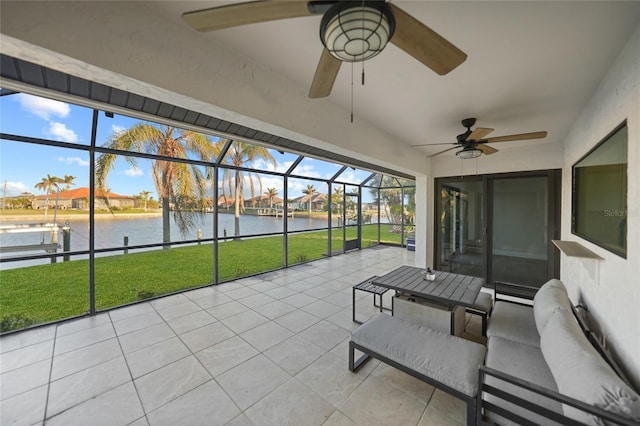 sunroom featuring a wealth of natural light and ceiling fan