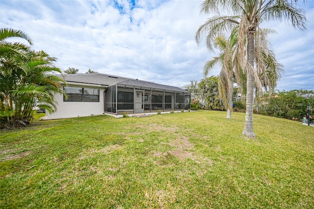 view of yard featuring a lanai