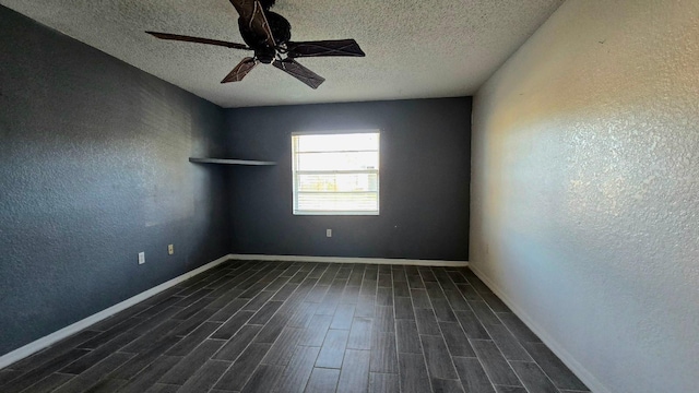 spare room featuring ceiling fan and a textured ceiling