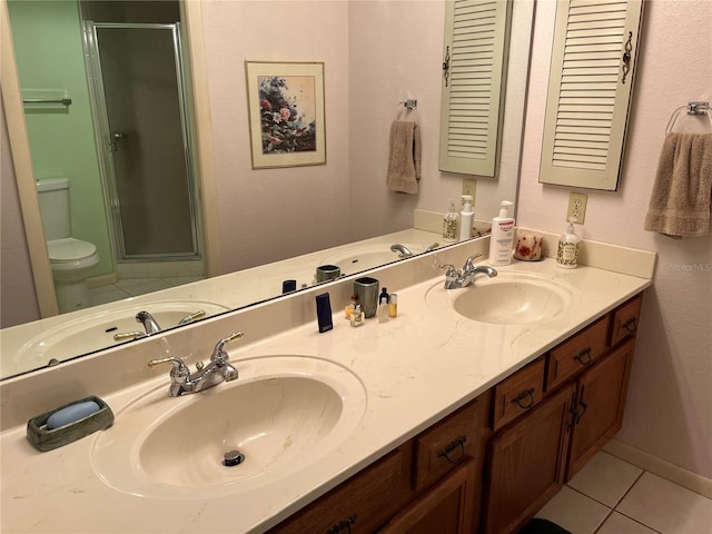 full bathroom with tile patterned flooring, a sink, and toilet