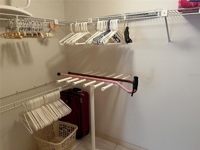 walk in closet featuring light tile patterned floors