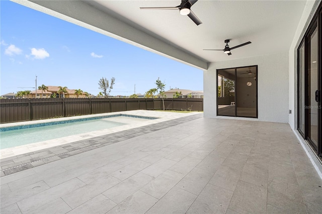 view of pool with a fenced backyard, ceiling fan, a fenced in pool, and a patio