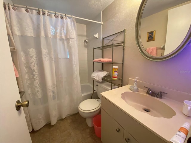 full bathroom featuring toilet, vanity, a textured ceiling, and shower / bath combo with shower curtain