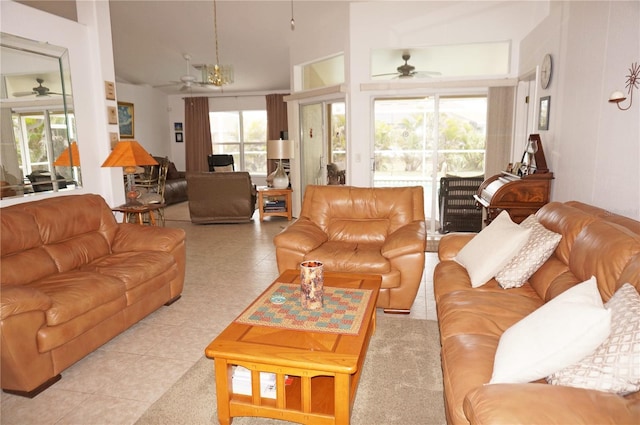 tiled living room with ceiling fan