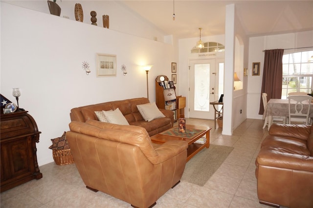 tiled living room with vaulted ceiling