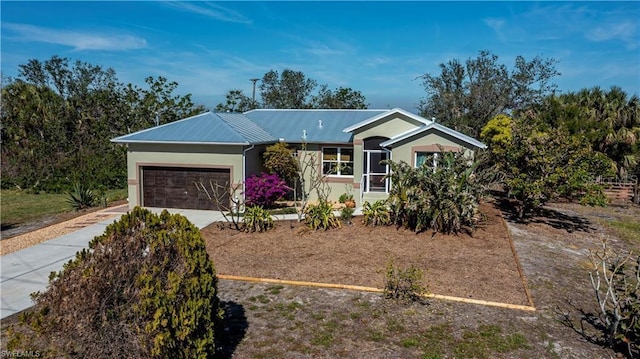 ranch-style home featuring a garage