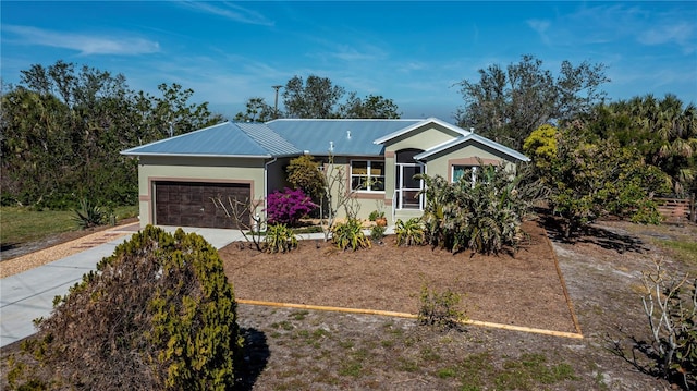 ranch-style house featuring a garage