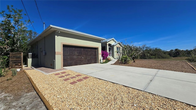 single story home featuring a garage