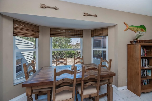 dining room featuring light tile patterned floors