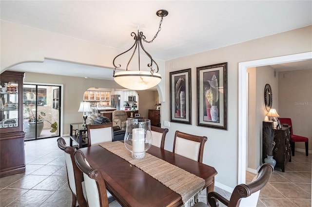 dining area with tile patterned flooring